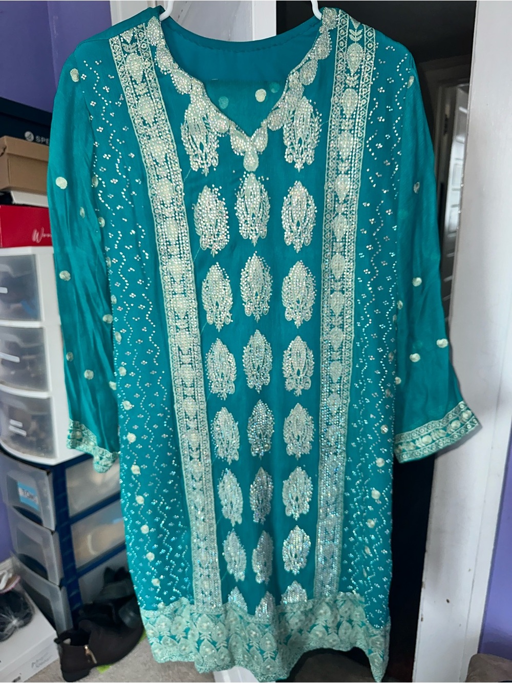 Embellished turquoise 3pc party salwar kameez.